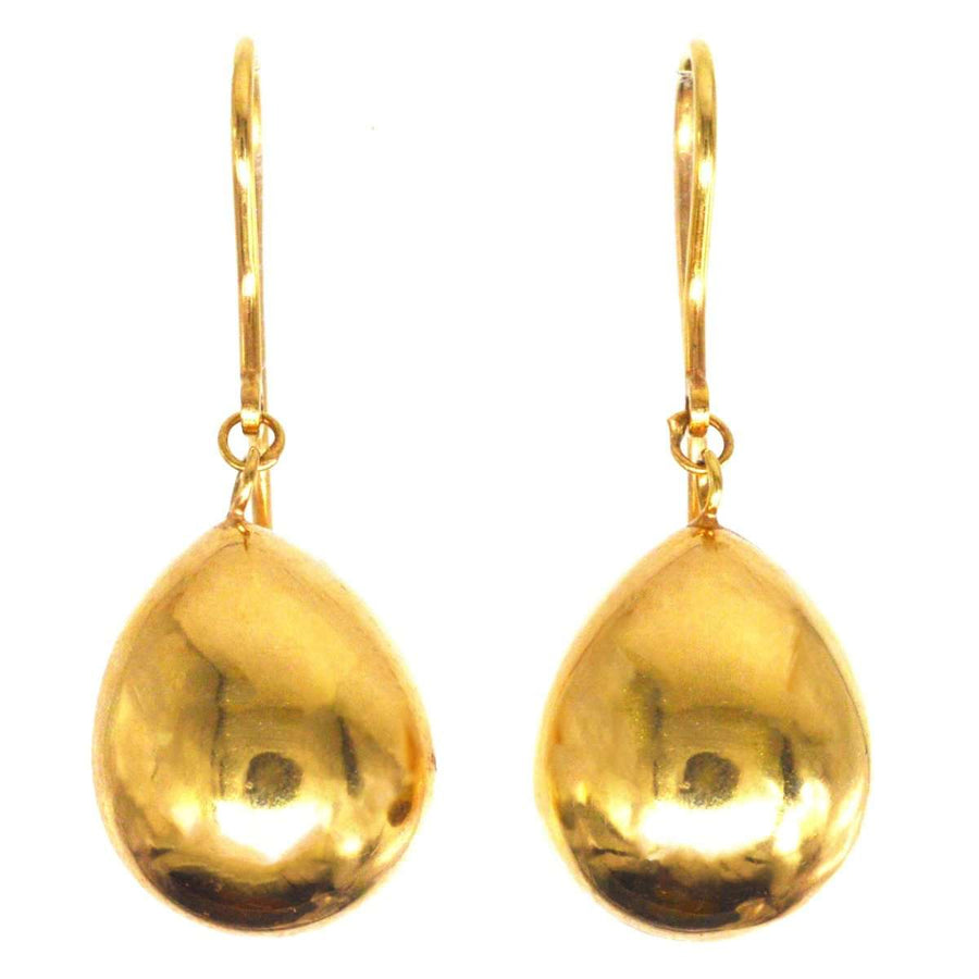 1940s 9ct gold earrings featuring large sculptural teardrop design, vintage elegance and mid-century sophistication.