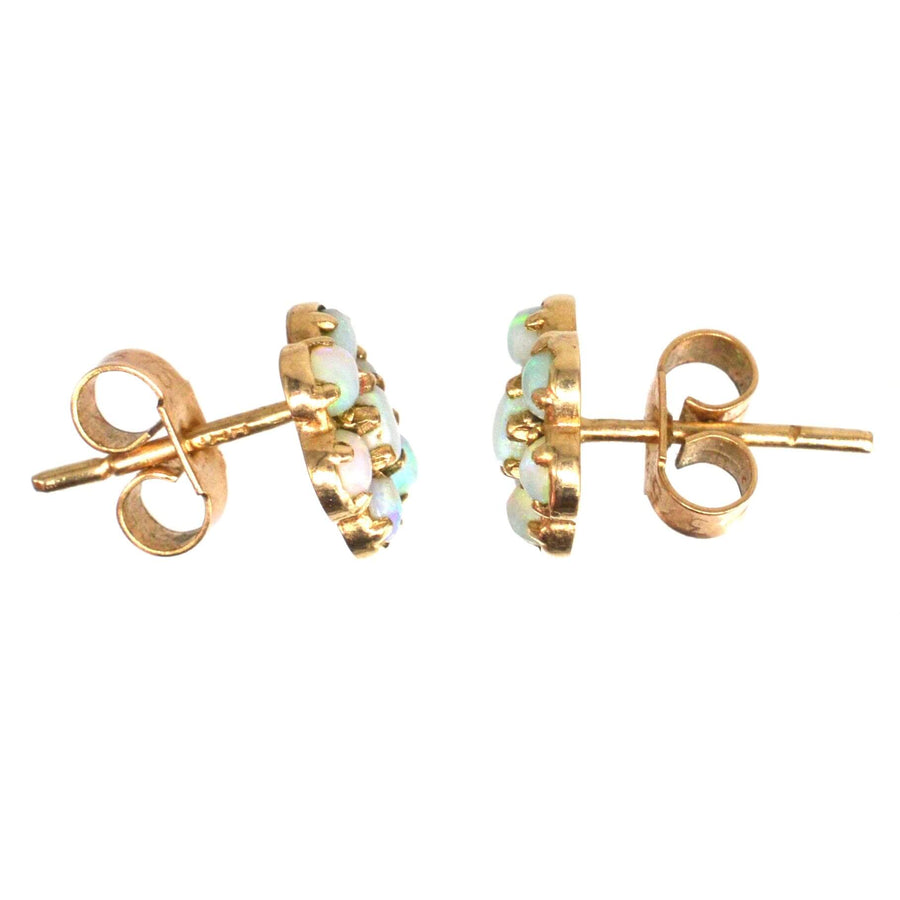 Vintage 9ct gold cluster stud earrings featuring colorful natural opals, showcasing elegant design and timeless charm.