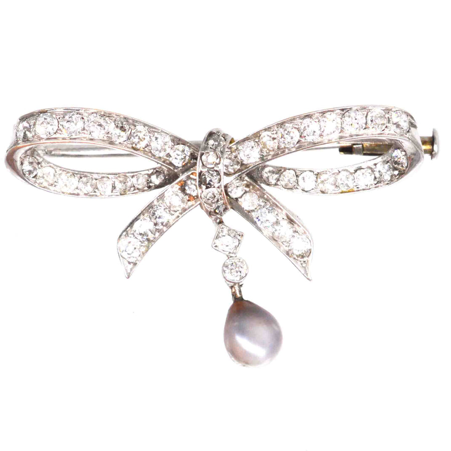 Early 20th Century 14ct White Gold Diamond and Grey Pearl Bow Brooch