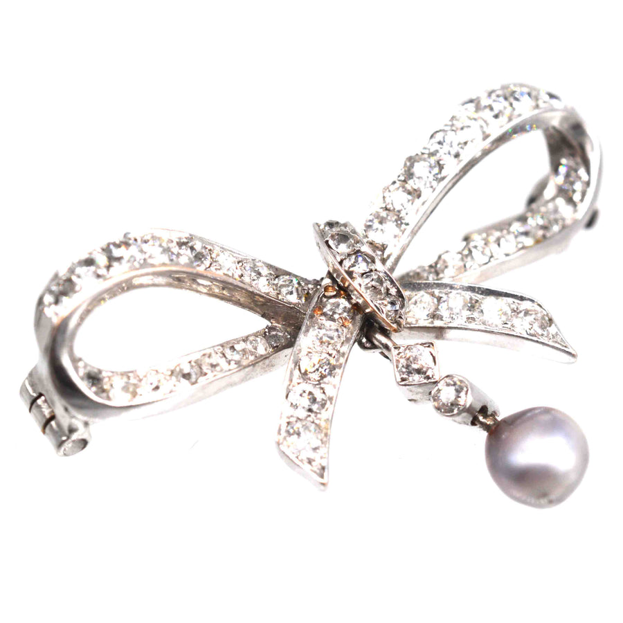 Early 20th Century 14ct White Gold Diamond and Grey Pearl Bow Brooch