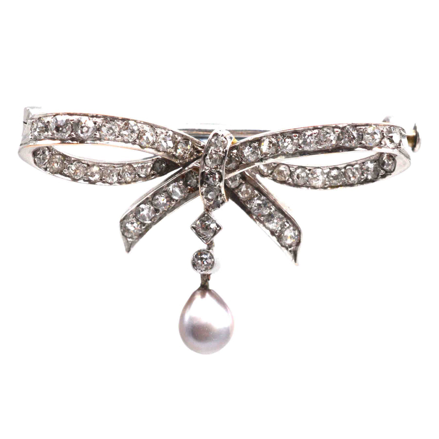Early 20th Century 14ct White Gold Diamond and Grey Pearl Bow Brooch