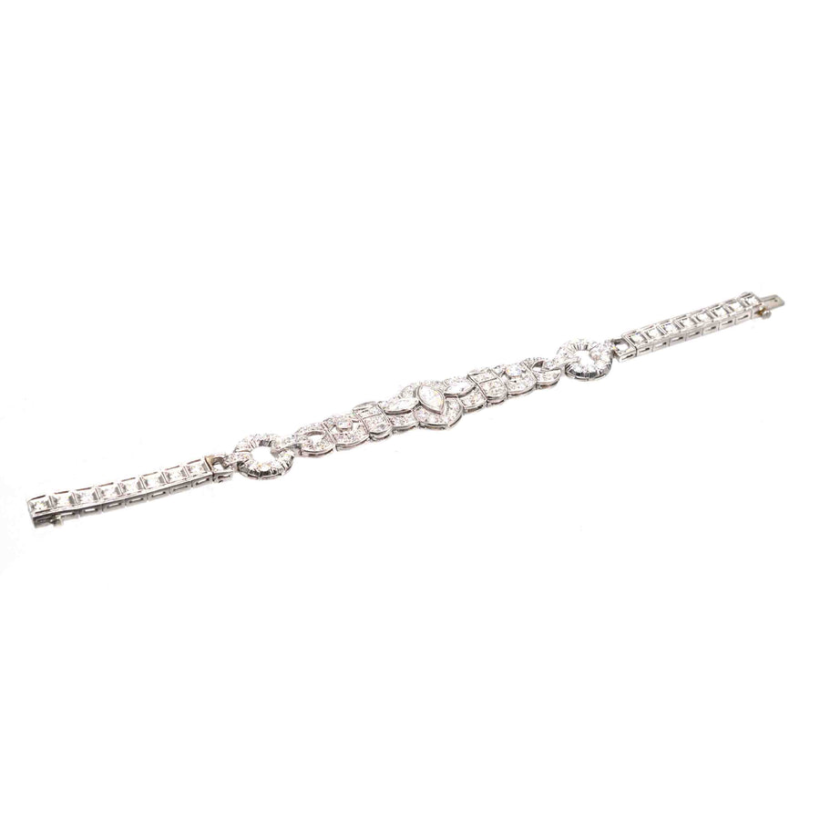 Art Deco 4 carat diamond bracelet in iridium and platinum, featuring geometric design and vintage elegance from the 1930s.