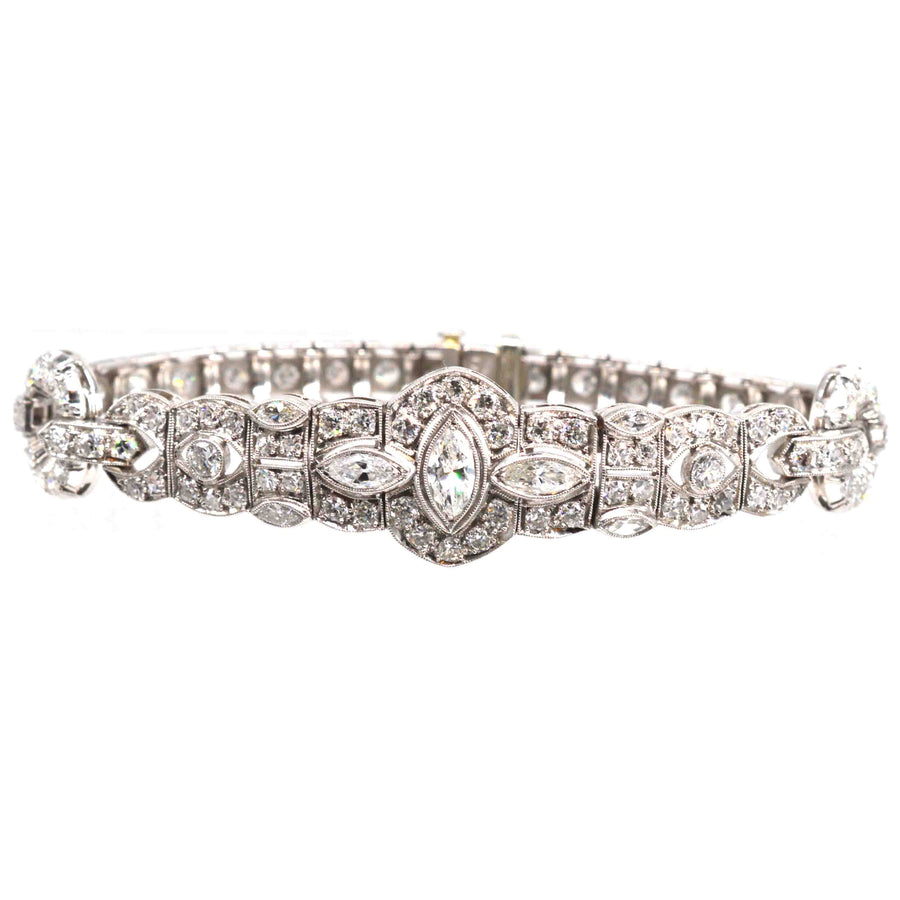 Art Deco 1930s platinum diamond bracelet featuring 4 carats of diamonds in a geometric design.
