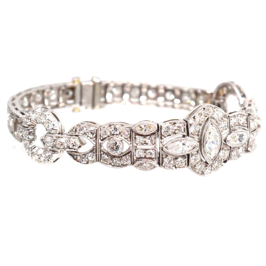 Art Deco iridium platinum diamond bracelet with 4 carats of geometric diamonds, dating to the 1930s.