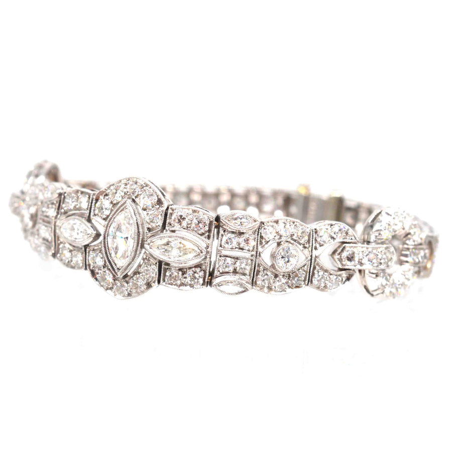 Art Deco Iridium Platinum 4 carat diamond bracelet from the 1930s, featuring a geometric design with vibrant diamonds.