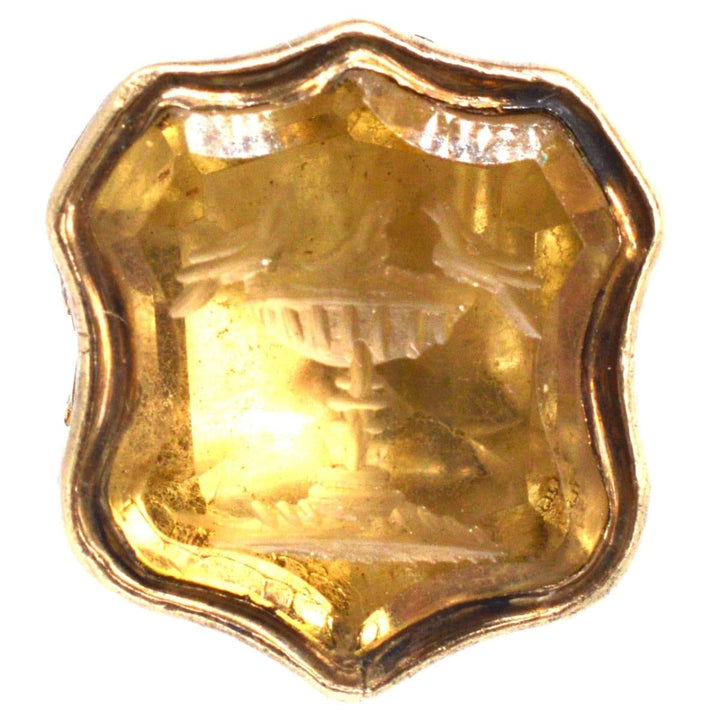 Early Victorian gold seal with citrine intaglio depicting doves on a bird bath, symbolizing love and grace.