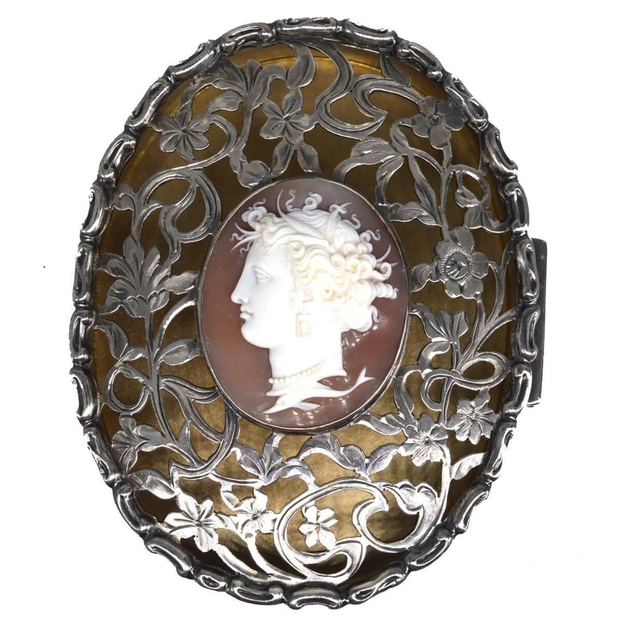 Edwardian sterling silver oval trinket box with cameo of Aphrodite, intricate floral cut-card design.