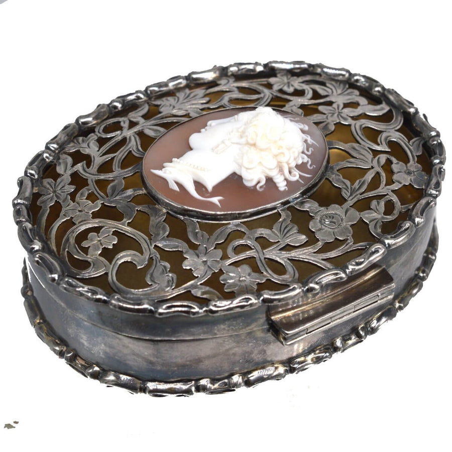 Edwardian sterling silver oval trinket box with Italian cameo of Aphrodite, London 1912, featuring intricate cut-card work.
