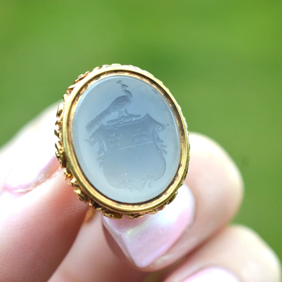 Large Georgian seal with chalcedony intaglio, featuring a peacock crest and family coat of arms.