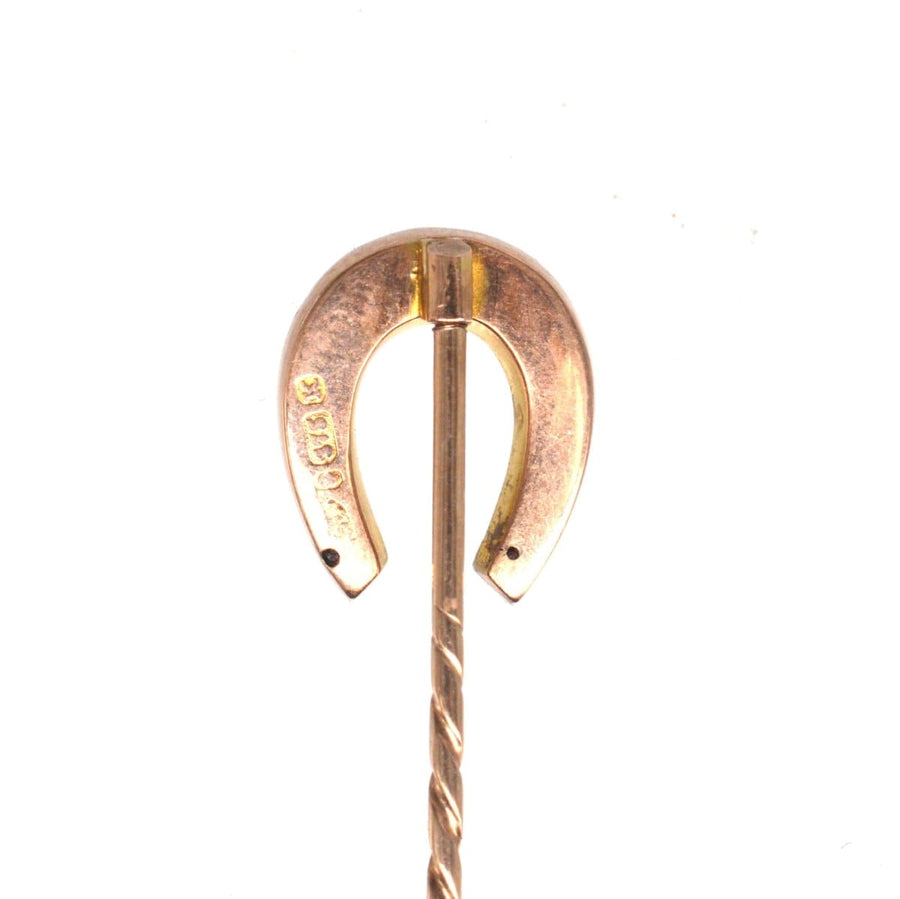 Late Victorian 9ct gold horseshoe tie pin with seed pearls, symbolizing luck and protection from evil.