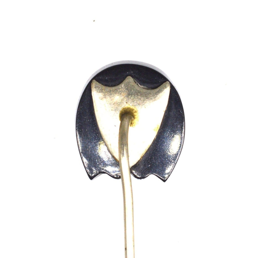 Late Victorian Whitby Jet horseshoe tie pin featuring a unique upside-down heart design.