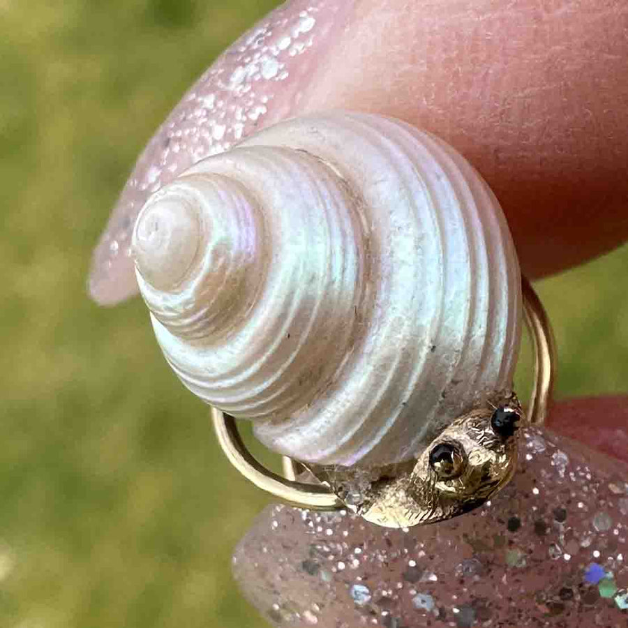 Tiny Victorian 18ct gold snail brooch pin with natural sea shell and black enamel eyes.