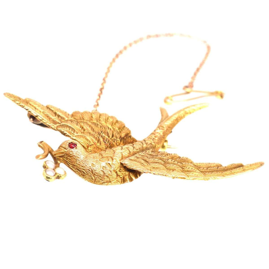Victorian 15ct gold swallow necklace with pearl flower, symbolizing love and faithfulness.