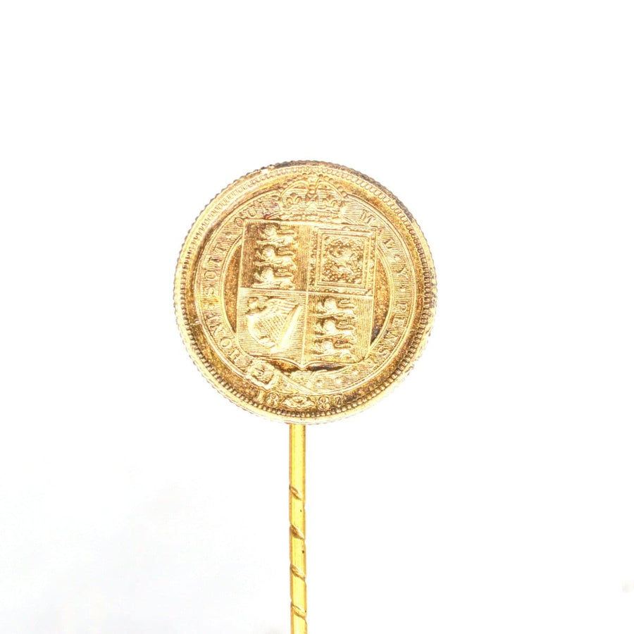 Victorian 1887 Queen Victoria silver sixpence tie pin with a detailed shield design.