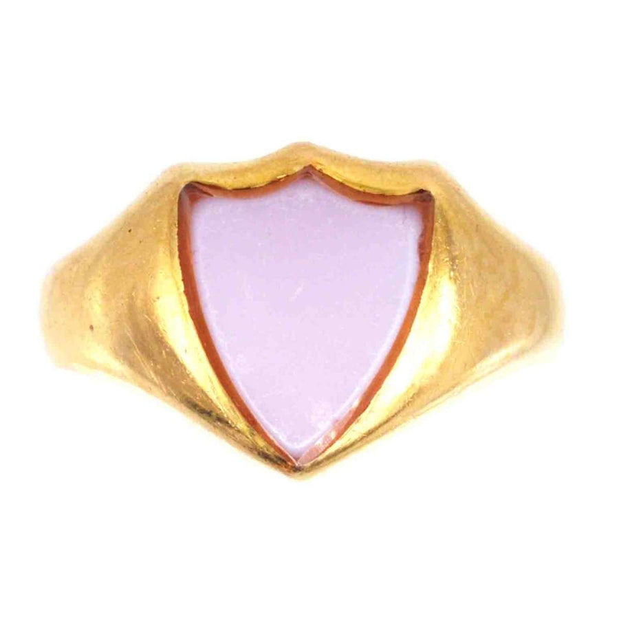 Victorian 18ct gold signet ring featuring a shield-shaped carnelian stone, circa 1890s craftsmanship.