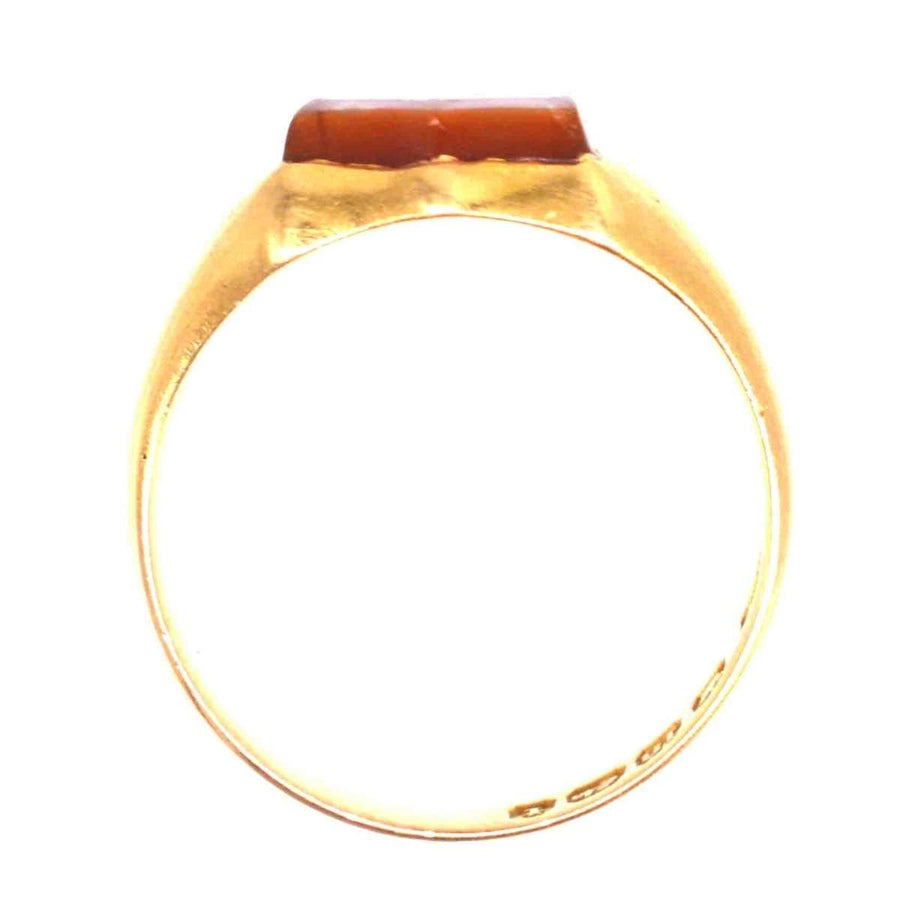 Victorian 18ct gold signet ring with shield-shaped carnelian stone, circa 1890s craftsmanship.
