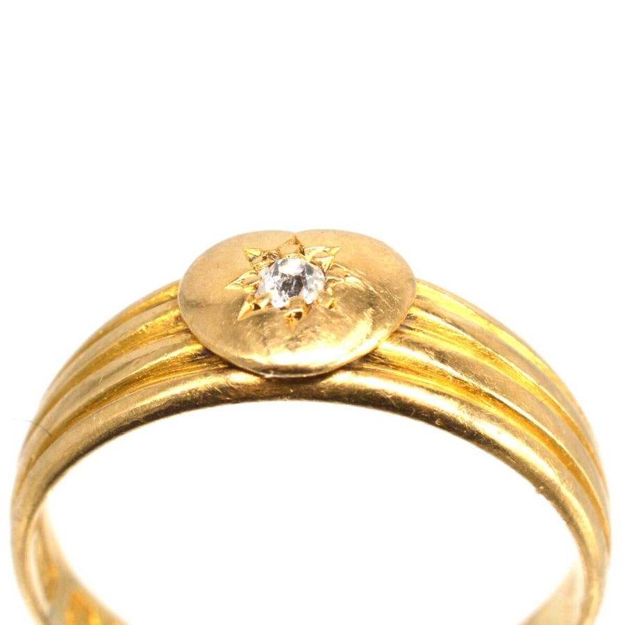Victorian 18ct gold keeper ring featuring a heart and diamond, showcasing elegant fluted detailing.