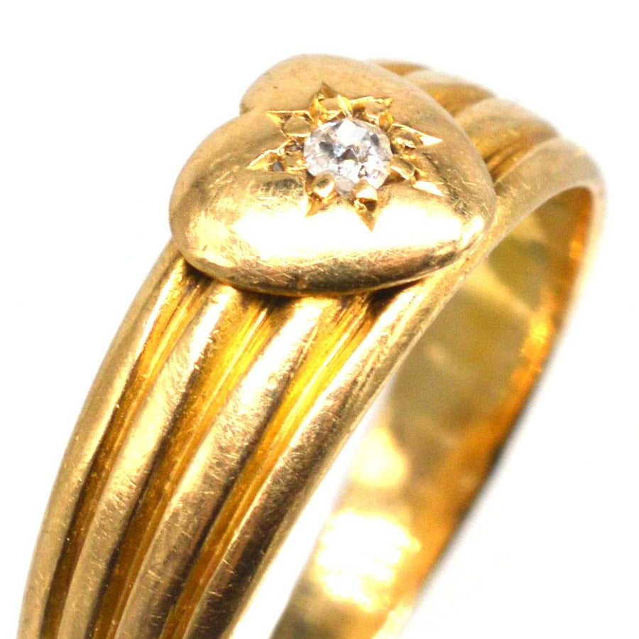 Victorian 18ct gold keeper ring featuring a heart design and an old mine cut diamond, hallmarked in Chester 1893.