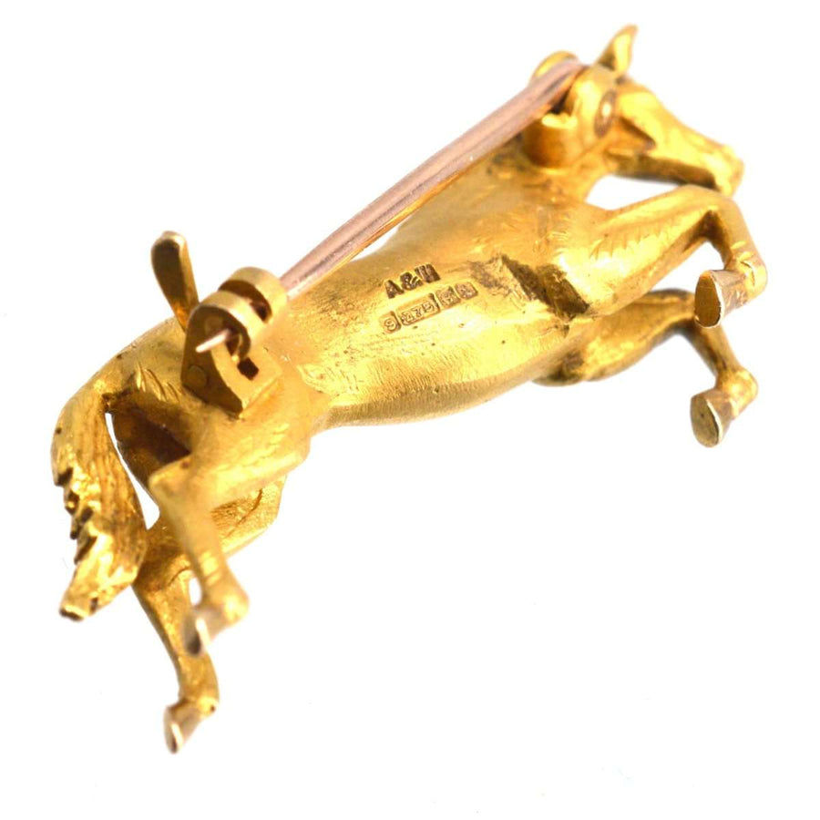 Vintage 9ct gold horse brooch by Alabaster & Wilson, capturing equestrian elegance and craftsmanship.