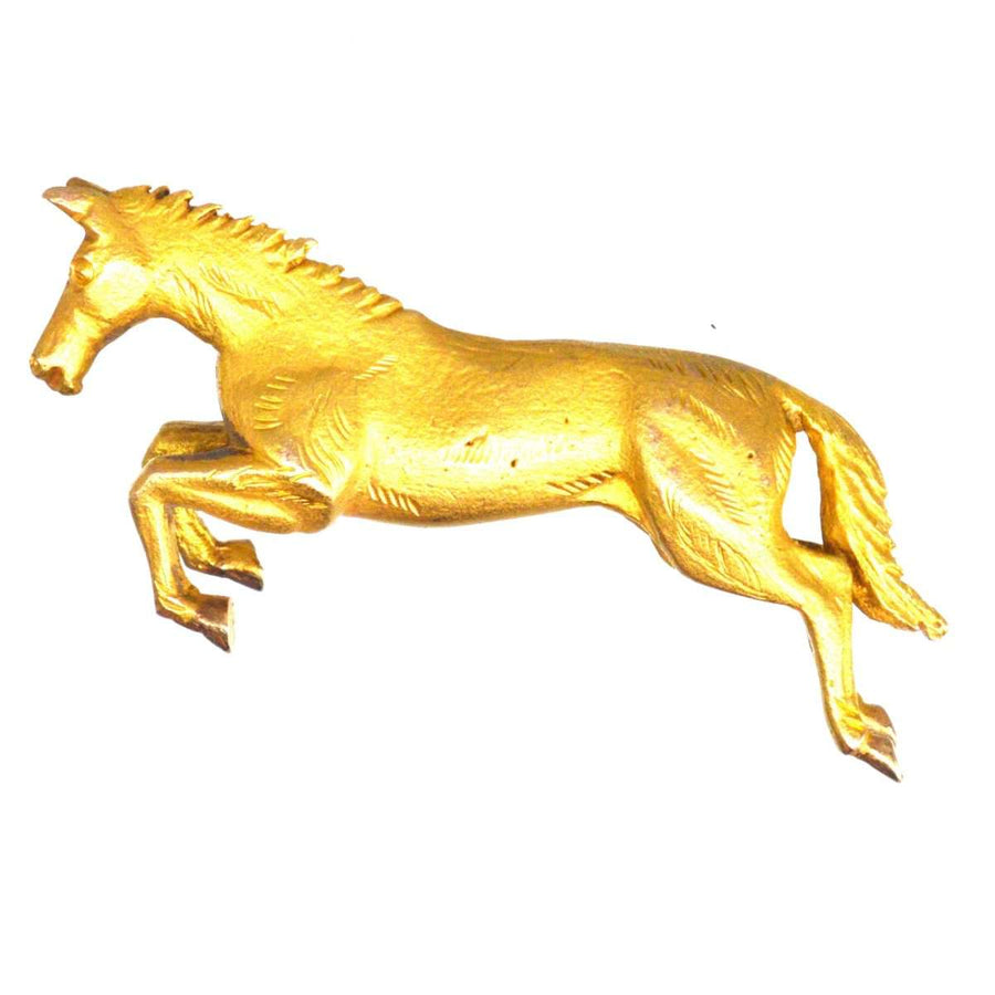 Vintage 9ct gold jumping horse brooch by Alabaster & Wilson, showcasing equestrian elegance and craftsmanship.