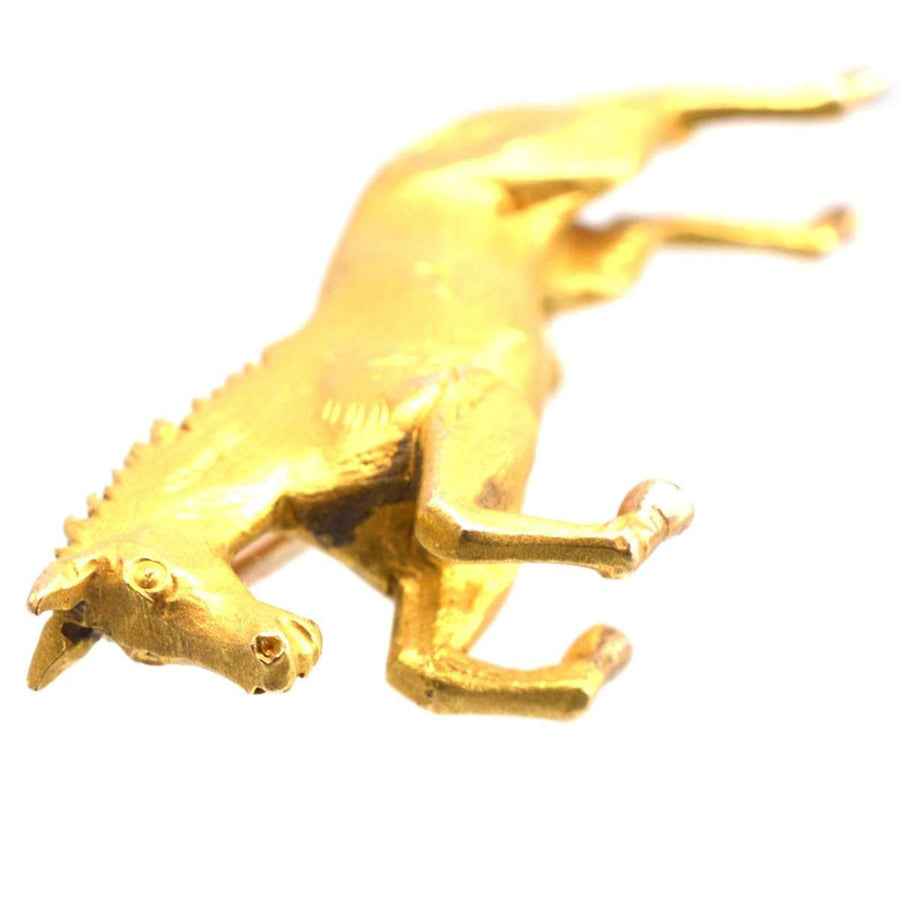 Vintage 9ct gold jumping horse brooch by Alabaster & Wilson, showcasing equestrian elegance and craftsmanship.