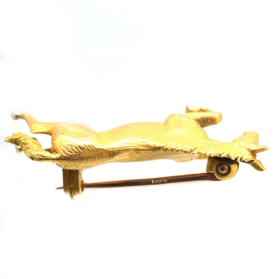 Vintage 9ct gold brooch of a horse mid-jump, crafted by Alabaster & Wilson, showcasing equestrian elegance.