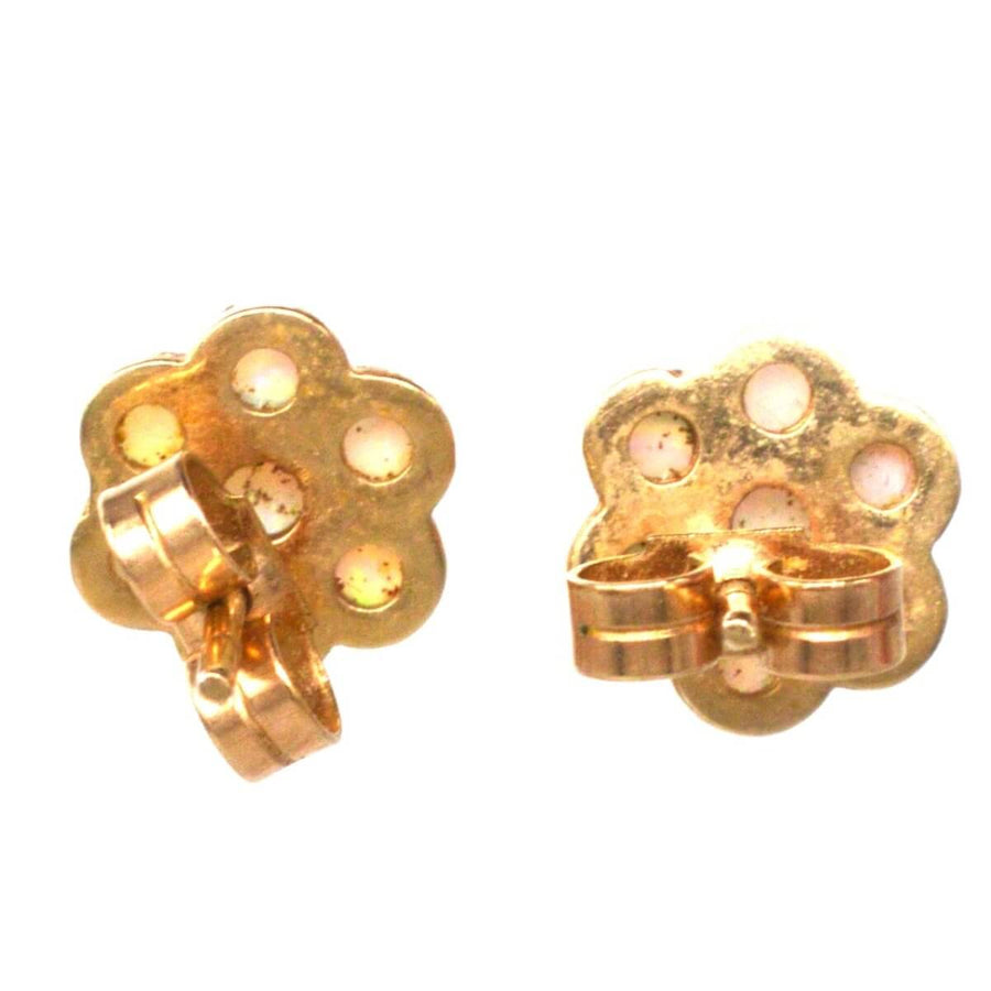 Vintage 9ct gold opal cluster stud earrings featuring a floral design with elegant backs, perfect for everyday or evening wear.