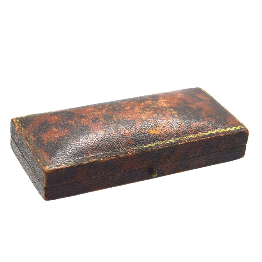 1930s Art Deco cufflinks case in vintage brown leather with elegant craftsmanship.