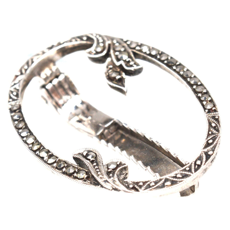1930s German silver oval marcasite brooch clip with leaf motifs, perfect for ties, lapels, or hats.