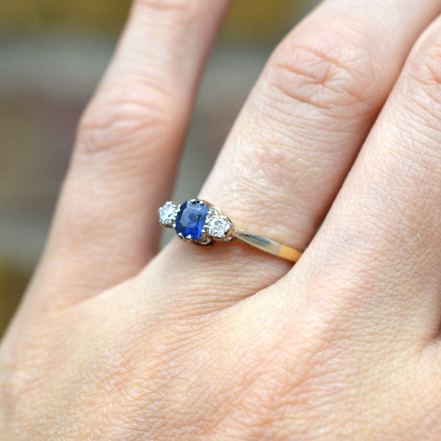 1940s 18ct gold and platinum three stone sapphire and diamond ring with Asscher cut sapphire.