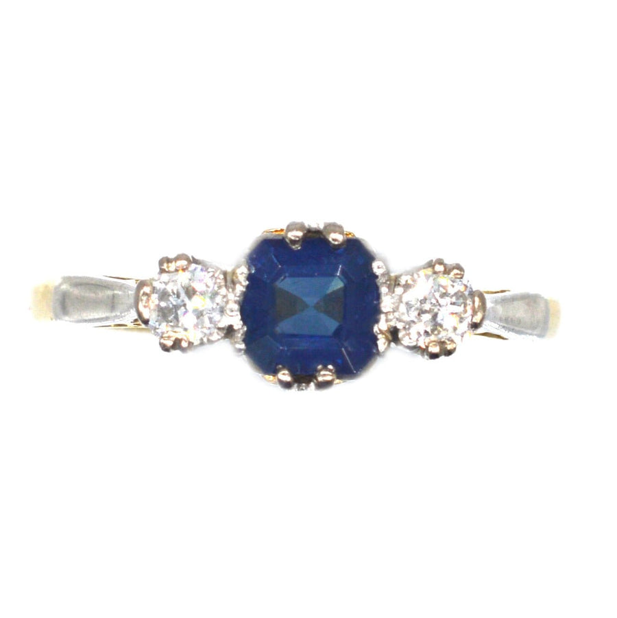 1940s 18ct gold and platinum Asscher cut sapphire and diamond three stone ring.