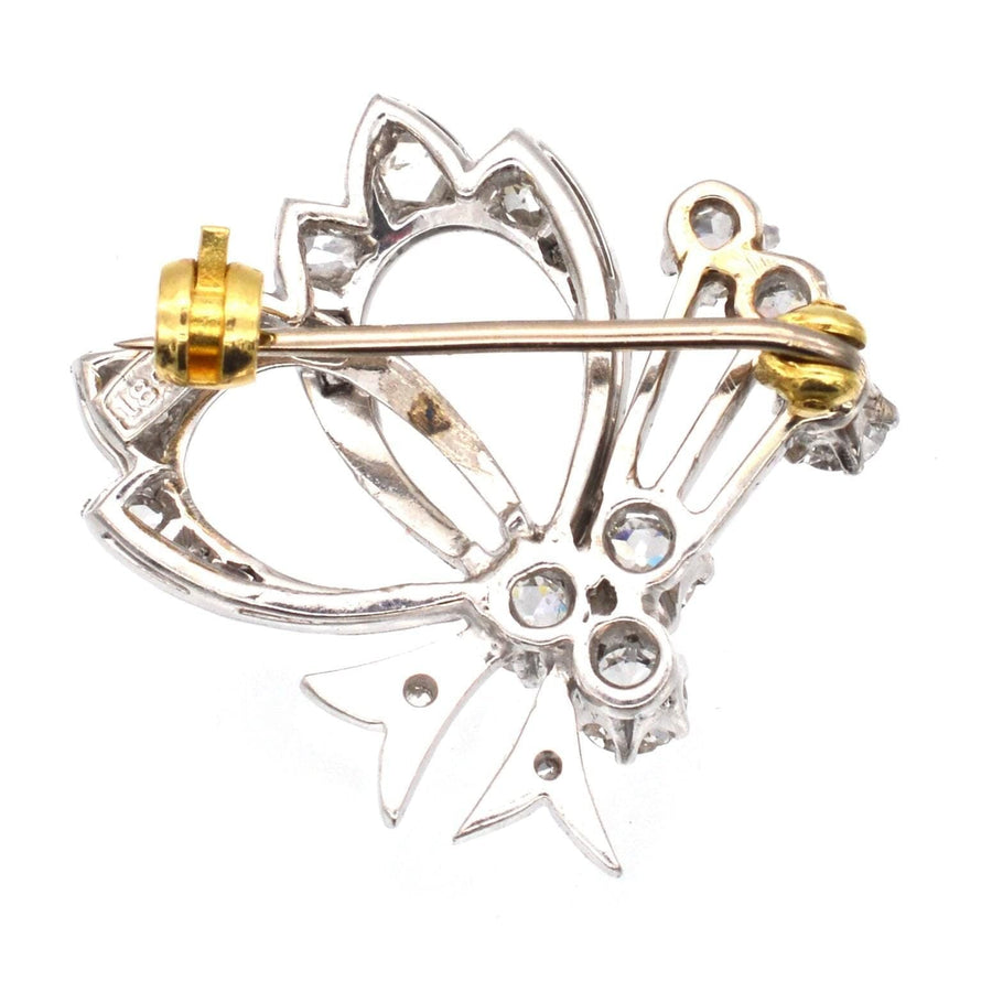 1940s 18ct white gold diamond bow brooch with one carat of diamonds in a vintage design.