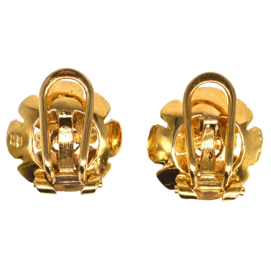 9ct gold flower clip-on earrings from the 1940s, showcasing detailed craftsmanship and Birmingham hallmarks.