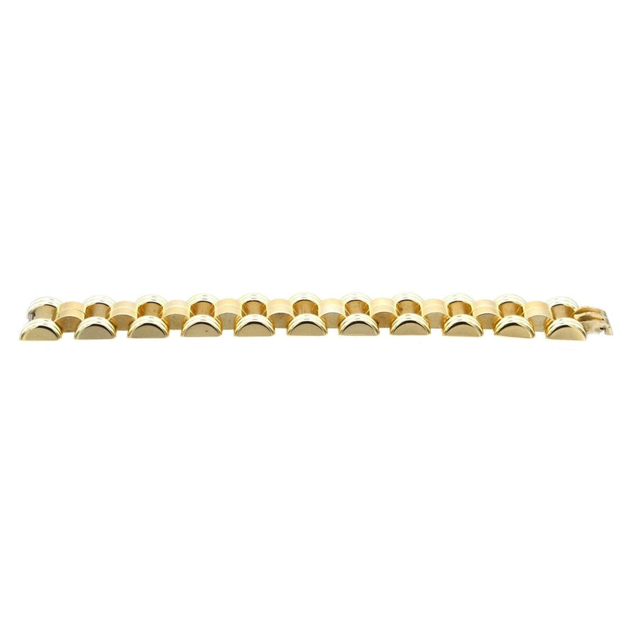 1940s French geometric gold-tone tank bracelet, featuring moving shapes and vintage design.