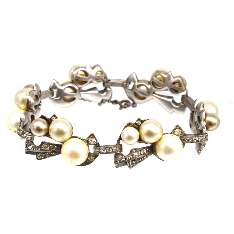 1940s Retro sterling silver bracelet with faux pearls and paste stones, showcasing a classic vintage design.