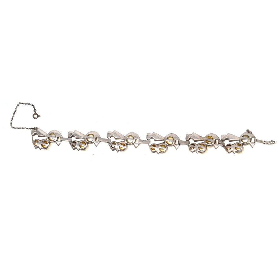 1940s Retro sterling silver bracelet with faux pearls and white paste stones, featuring an architectural design.