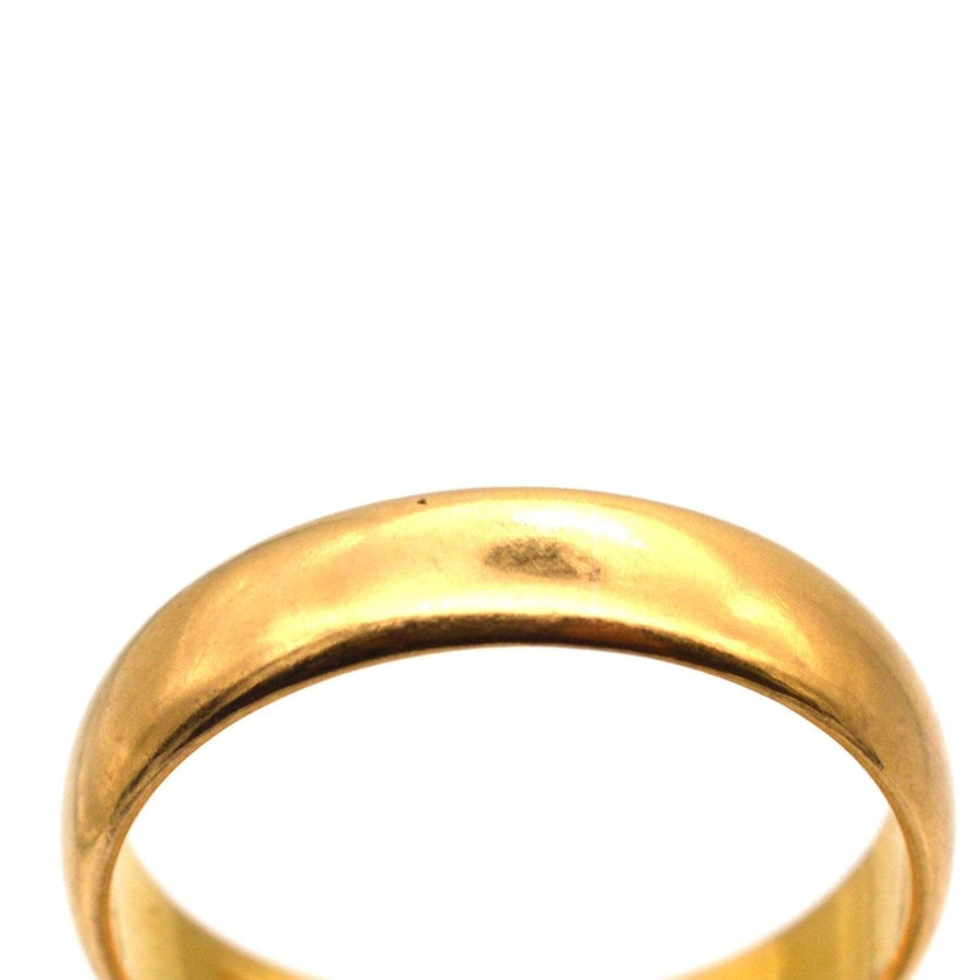 1950s 22ct gold wedding ring, made in Birmingham in 1955, featuring a smooth, buttery gold finish.