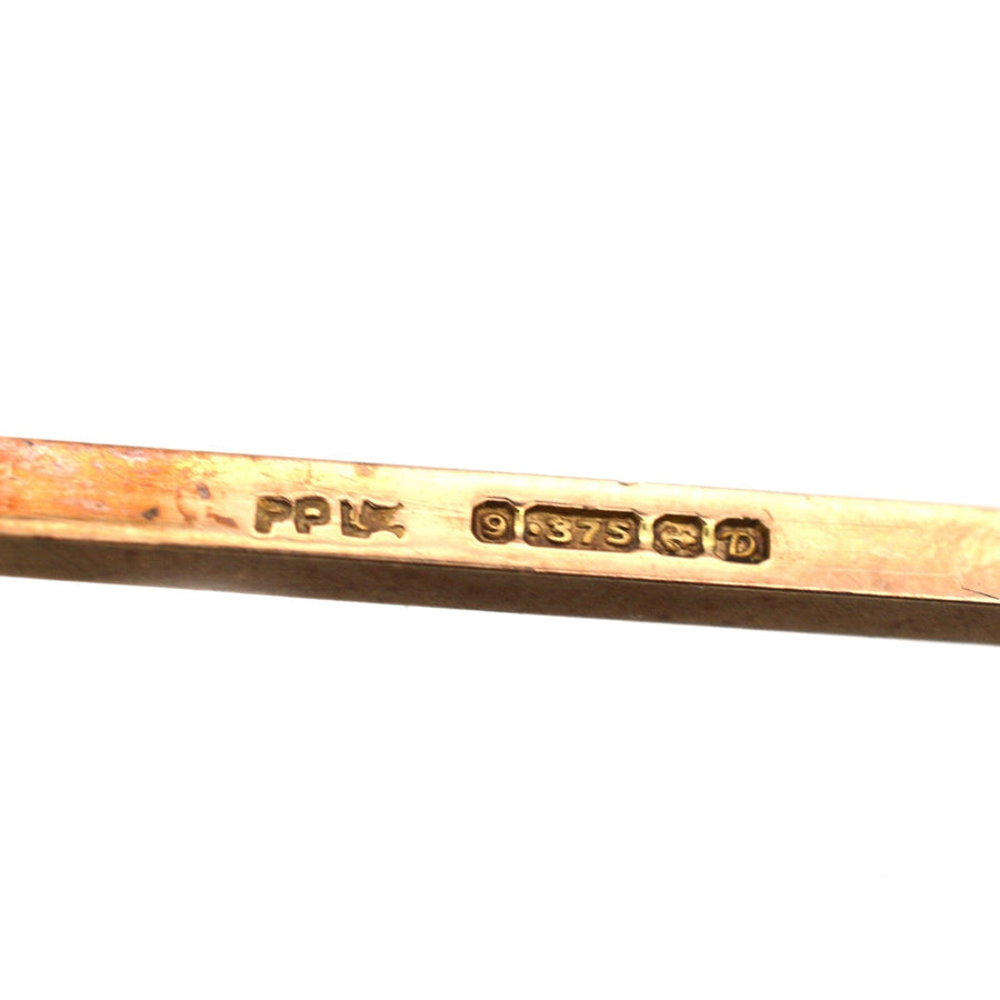 Hallmark detail of 1950s 9ct gold bar brooch by Payton, Pepper & Sons Ltd, featuring 9ct gold and maker's mark.