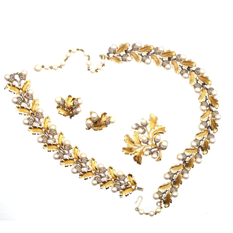 1950s Trifari gold-tone jewelry set with oak leaves, faux pearls, and rhinestones - necklace, earrings, bracelet, brooch.