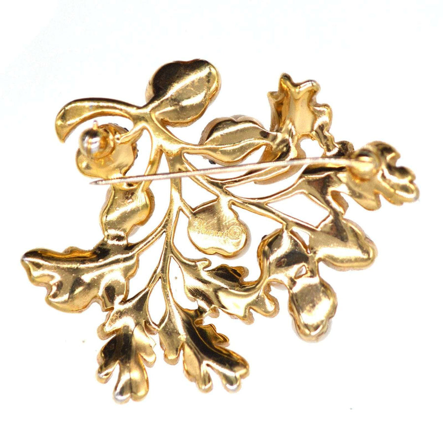 Vintage Trifari gold-tone oak leaf brooch with faux pearls, part of a 1950s jewelry set.