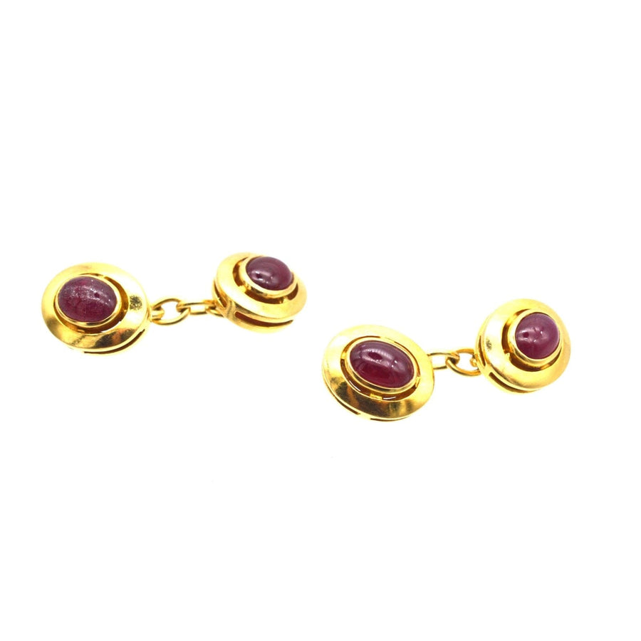 1960s 18ct gold cufflinks featuring natural unheated cabochon rubies, a classic and timeless design.
