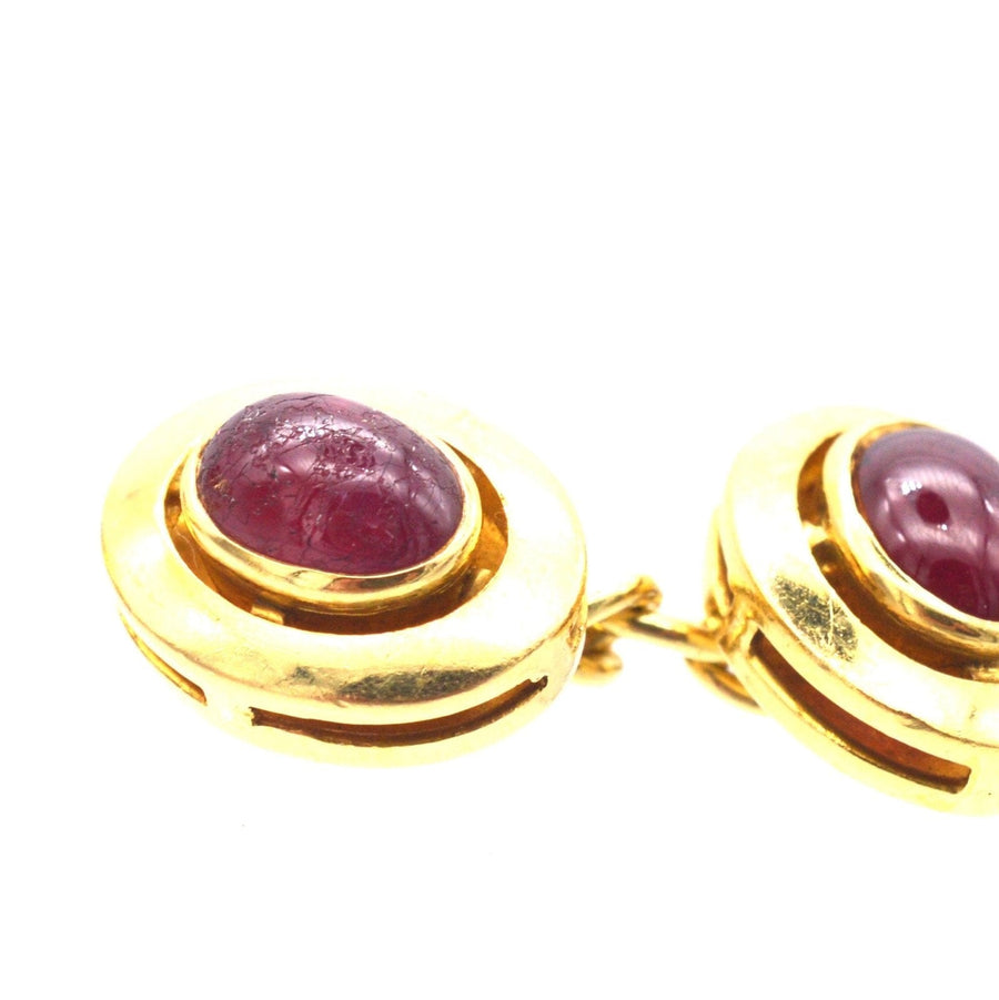 1960s 18ct gold cufflinks featuring natural unheated cabochon rubies, elegant and timeless design.