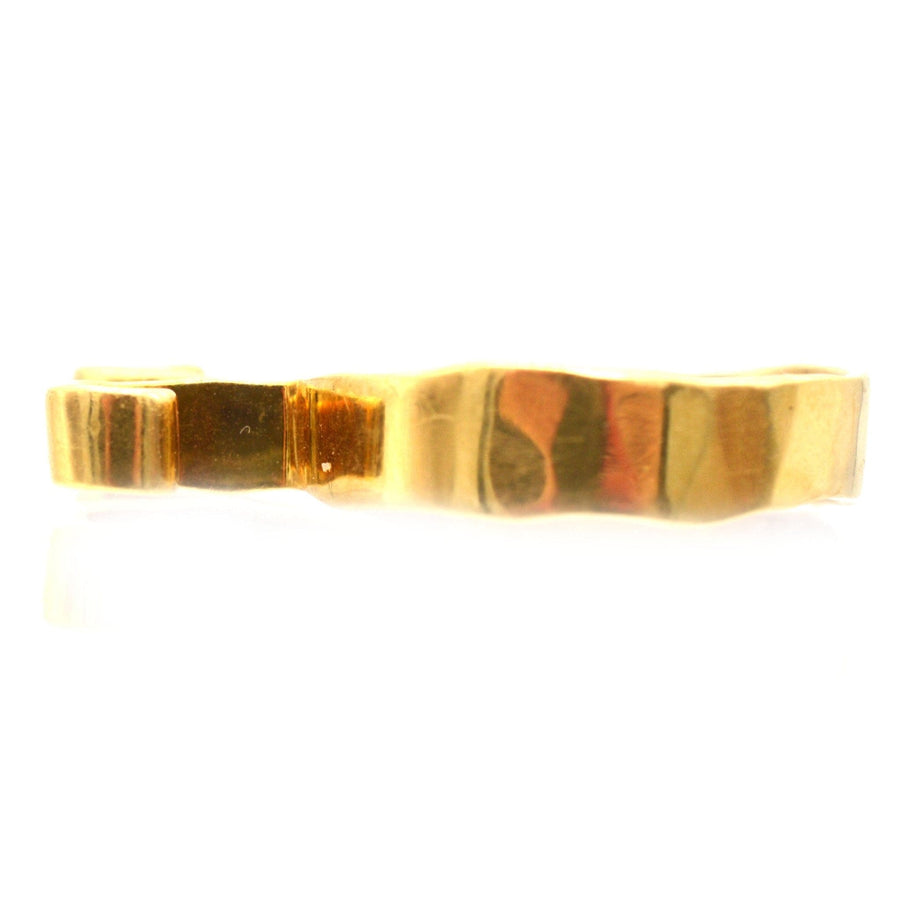 1960s 18ct gold Aries ring by Walter Schluep with unique textured design.