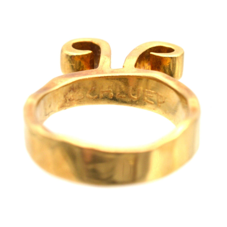 1960s 18ct gold Aries ring by Walter Schluep showcasing Aries symbol, vintage jewelry in original case.