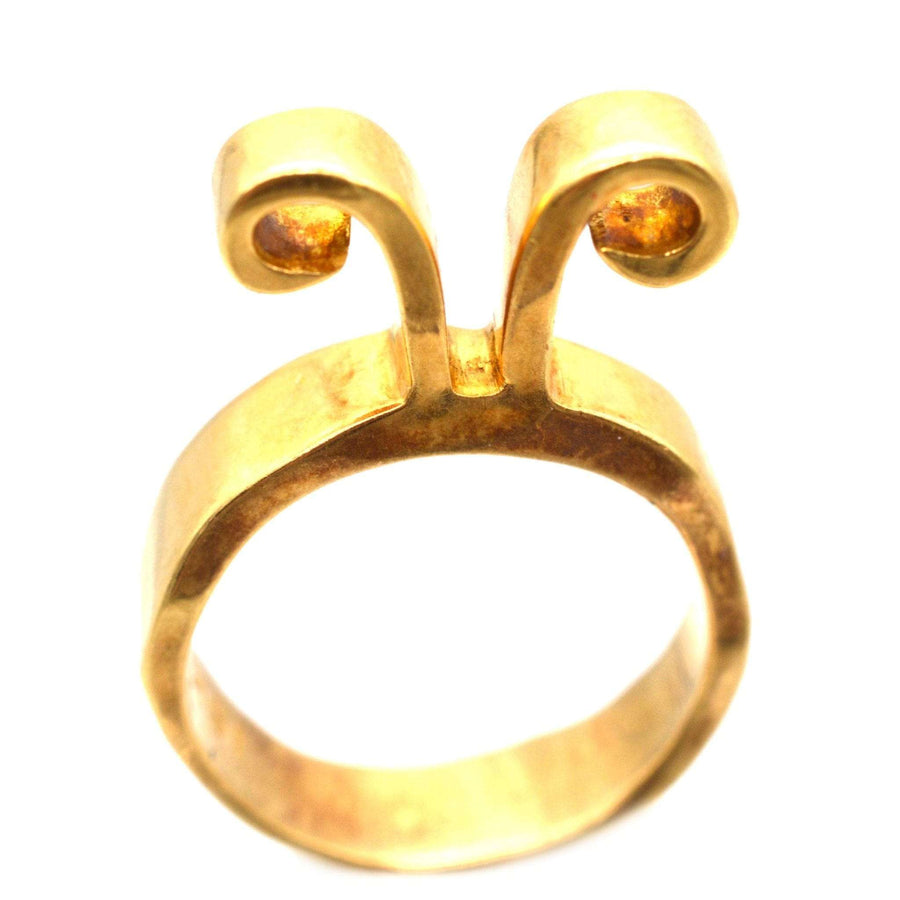 1960s 18ct gold Aries ring by Walter Schluep with unique design, featuring two gemstone accents, in original case.