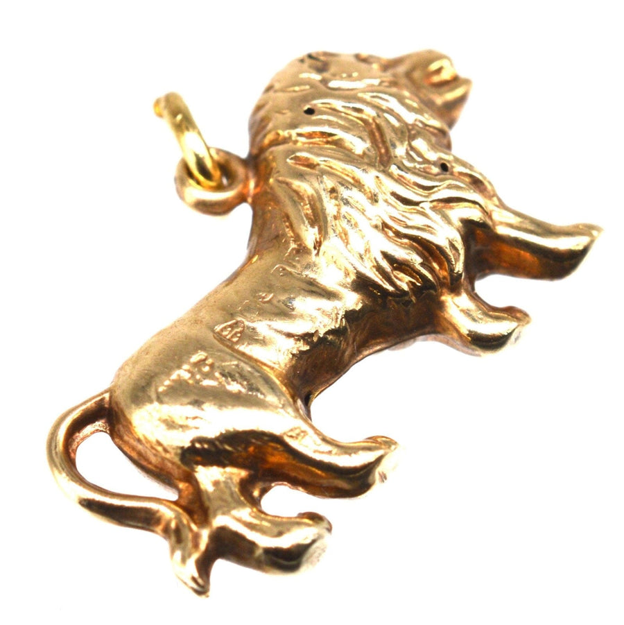 1960s 9ct Gold Leo Lion Charm Pendant showcasing majesty and strength, perfect for necklaces or bracelets.