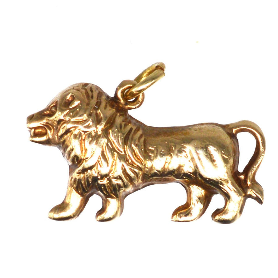 1960s 9ct gold lion charm pendant, symbolizing strength and courage, ideal for chains or bracelets.