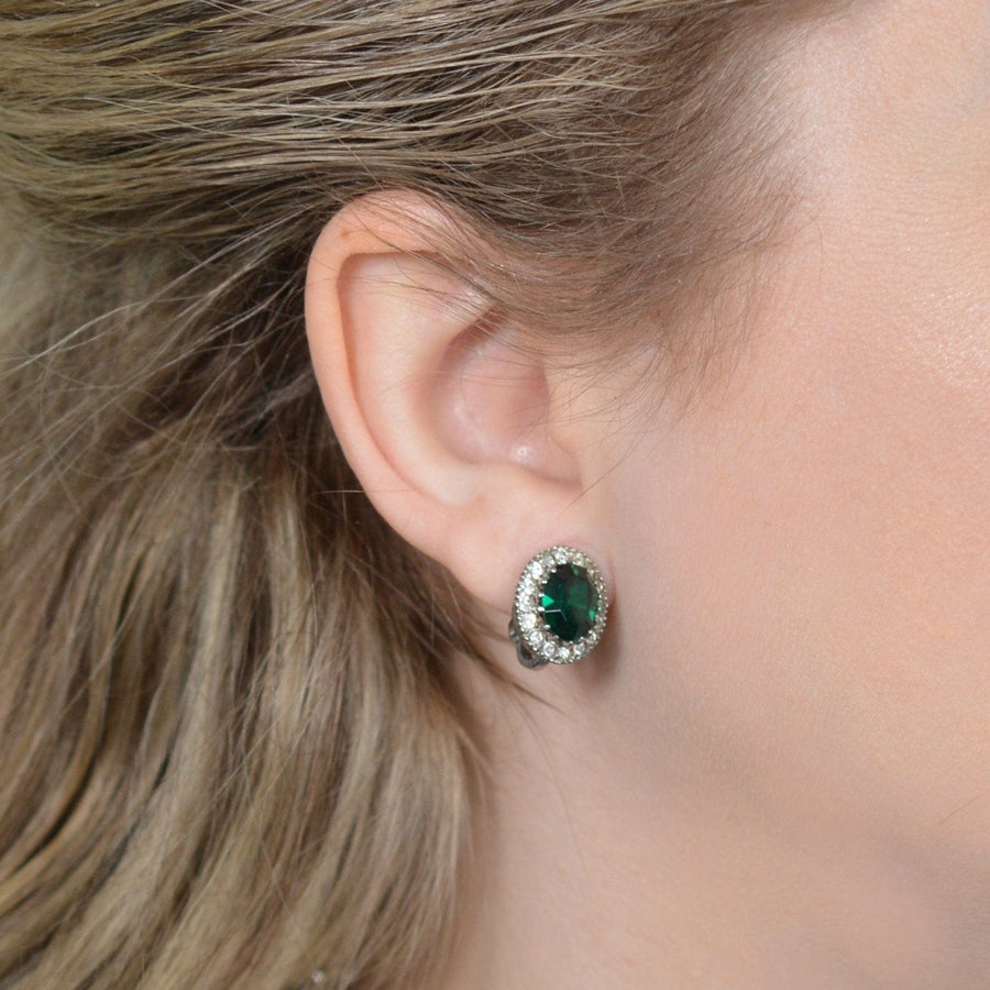 1960s green tourmaline paste earrings in silver, showcasing a glamorous vintage style and elegant design.
