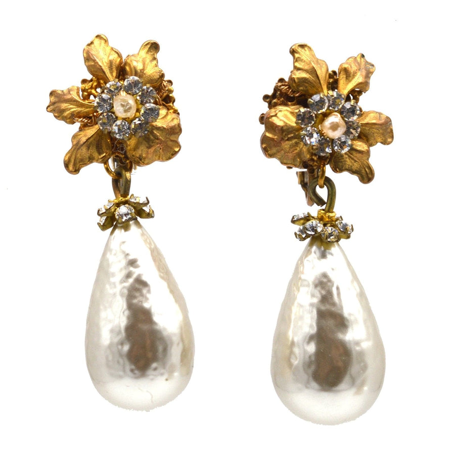 1960s Miriam Haskell faux pearl earrings with floral design and sparkling accents.
