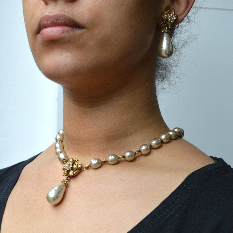 1960s Miriam Haskell faux pearl necklace with vintage style earrings, showcasing elegant costume jewelry.